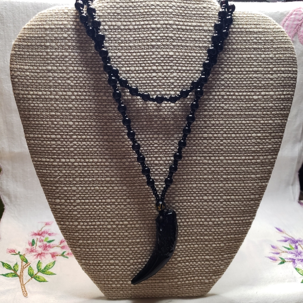 Elegant Black Glass Beaded Necklace with Glass Wolf Tooth Pendant